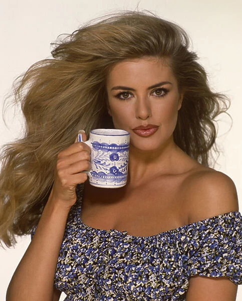 Kirsten Imrie holding a white  /  blue mug