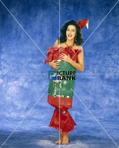 Smiling Gallery: Girl, dark hair, dressed as Christmas cracker