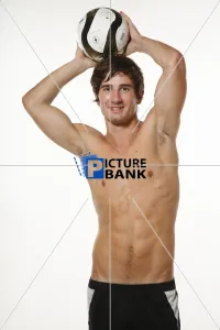 Young man posing indoors