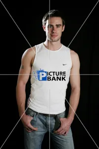 Young man posing indoors